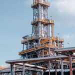 View of a large oil refinery plant with intricate pipelines in Trzebinia, Poland.