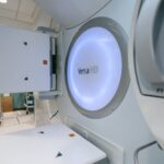 Close-up of Versa HD radiotherapy machine in a clinical setting.