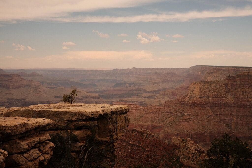 Breathtaking view of the Grand Canyon showcasing its vast sandstone formations and rugged beauty.