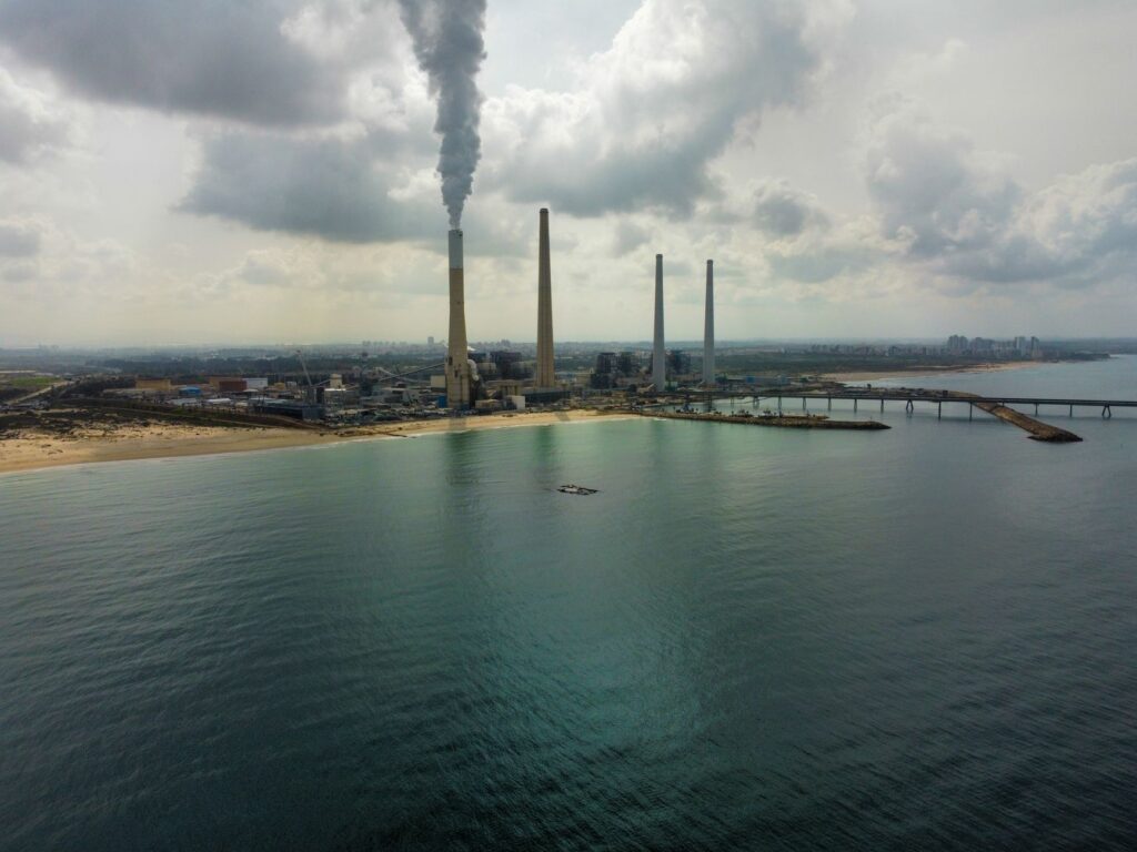 Aerial view of Orot Rabin Power Station in Hadera, Israel, overlooking the coastal area and industrial landscape.