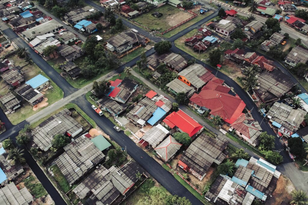 Aerial view showcasing a vibrant residential neighborhood with colorful rooftops.