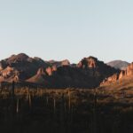 Stunning sunset over the cactus-filled Superstition Mountains, Arizona.