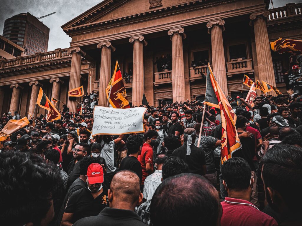 Massive political rally with protesters in Colombo, Sri Lanka, demanding change.