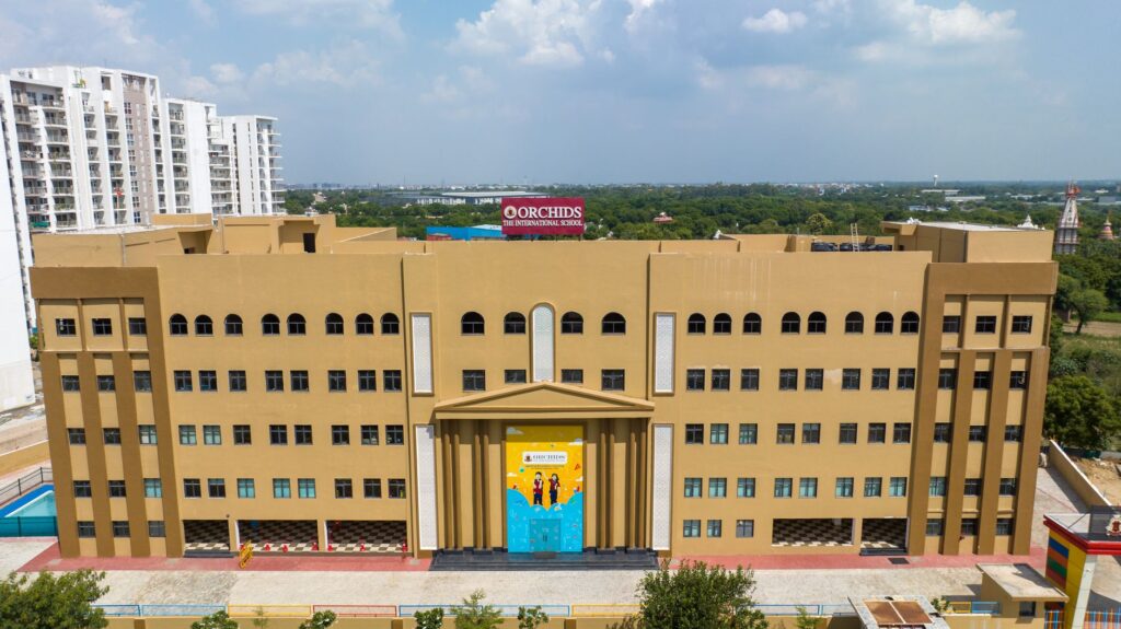 Aerial view of a modern educational building, Orchids The International School, in India.