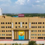 Aerial view of a modern educational building, Orchids The International School, in India.