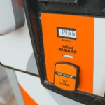 Detailed view of a gas pump showing price and octane level 87.