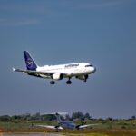 Lufthansa aircraft approaching for landing at Sylt Airport on a clear day.