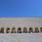 The iconic Hassan Tower, a beautiful historical minaret, in Rabat, Morocco on a clear sunny day.
