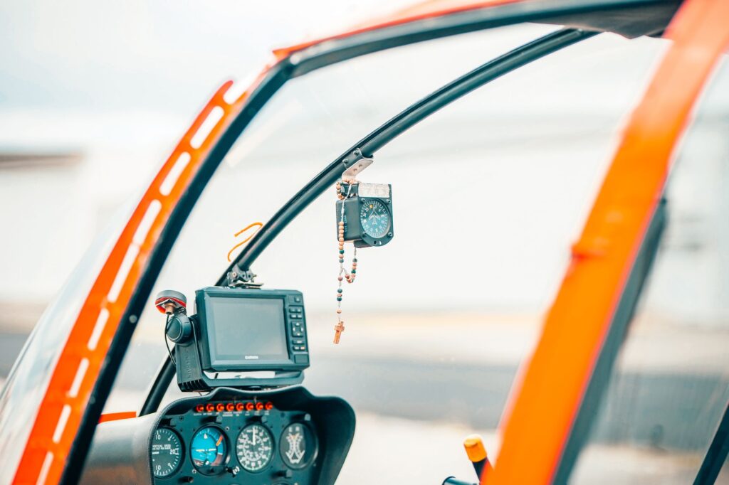 Detailed view of helicopter cockpit instruments inside an aircraft.