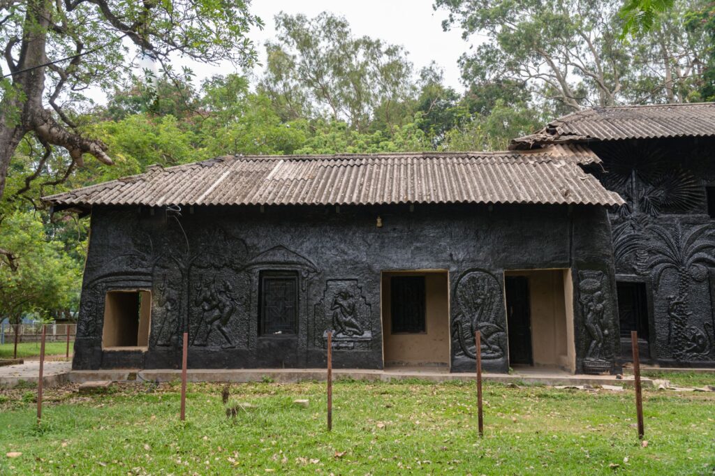 Black textured facade of Kala Bhavana at Visva Bharati University, Santiniketan.