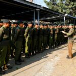 Gurkha soldiers in uniform during a training session in Pokhara, Nepal. Commanding officer addressing the troops.