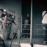 Capturing intense military film scenes with a crew in Lisbon, Portugal.