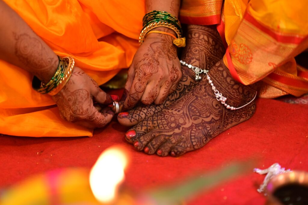 Beautiful mehndi designs on feet during an Indian ritual ceremony in Nagpur, India.