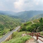 Beautiful green valleys and a winding road in South West Khasi Hills, India.
