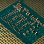 Detailed close-up of a microprocessor circuit board showcasing intricate circuitry and components.