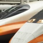 Close-up of high-speed trains at a modern station platform.