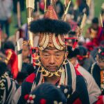 Vibrant capture of people in traditional tribal attire, showcasing cultural heritage.