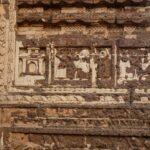 Detailed terracotta carvings on ancient temple wall in Bishnupur, West Bengal, India.