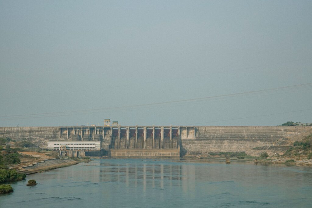 A serene view of a dam with a tranquil river in Gia Lai, Vietnam.