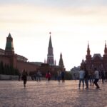 Visitors enjoy the iconic Red Square in Moscow, a UNESCO site, at sunset.