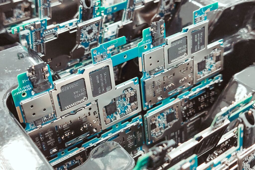 Close-up of intricate circuit boards in a Vietnamese factory, capturing modern electronics production.