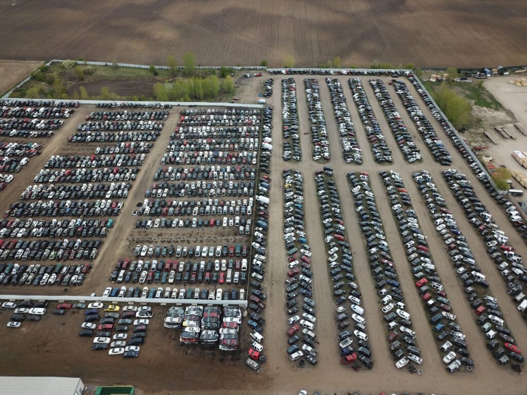 Aerial shot of a large vehicle storage or junkyard in Minnesota, USA.