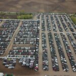 Aerial shot of a large vehicle storage or junkyard in Minnesota, USA.