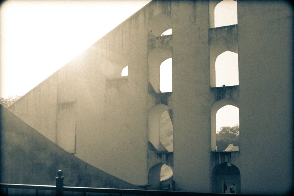 Sunlit view of the architectural marvel Jantar Mantar in Jaipur, Rajasthan, India.