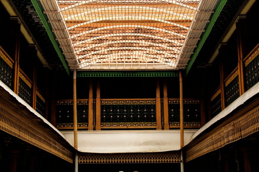 Elegant interior of Athangudi Palace showcasing traditional design and intricate tilework.