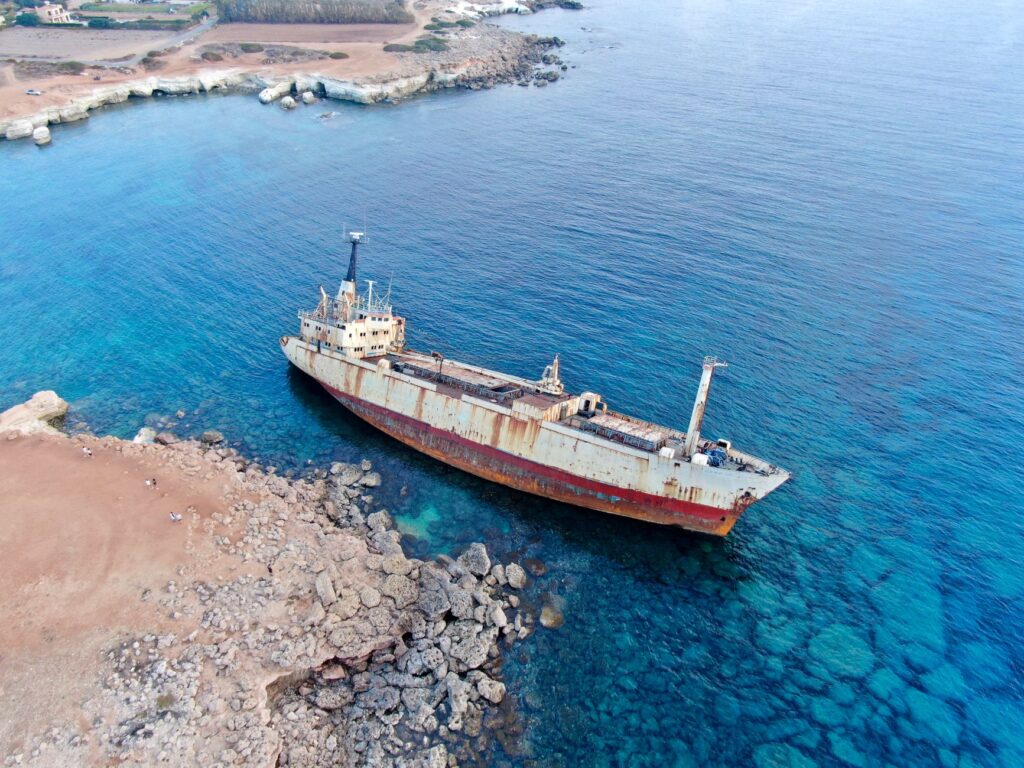 Aerial view of the iconic Edro III shipwreck along the coast of Peyia, Cyprus.