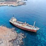 Aerial view of the iconic Edro III shipwreck along the coast of Peyia, Cyprus.