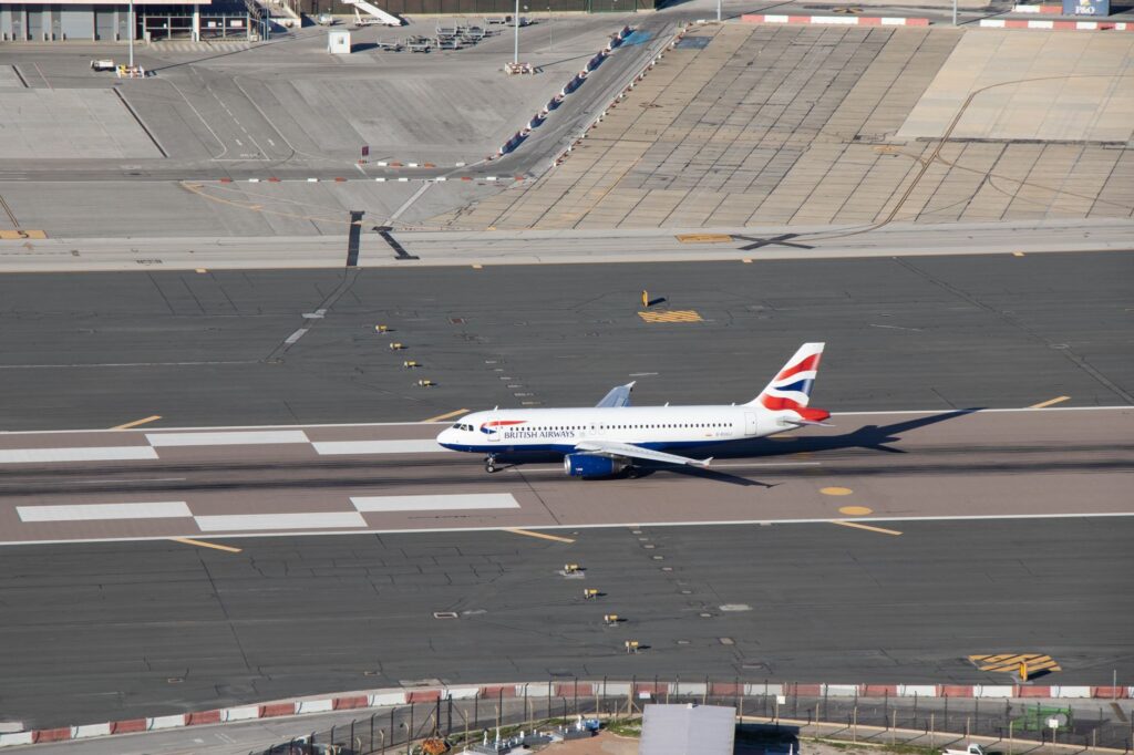 A British Airways aircraft on the runway, preparing for takeoff at Gibraltar Airport.