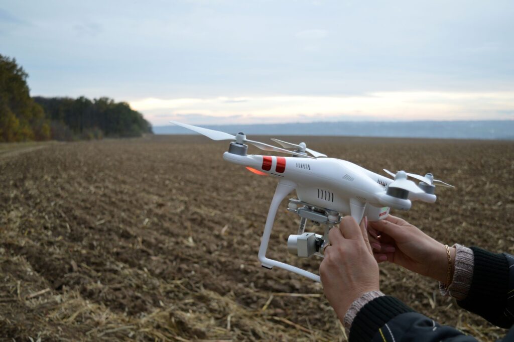 Drone preparation on a Ukrainian farm field, capturing rural landscapes and agriculture.