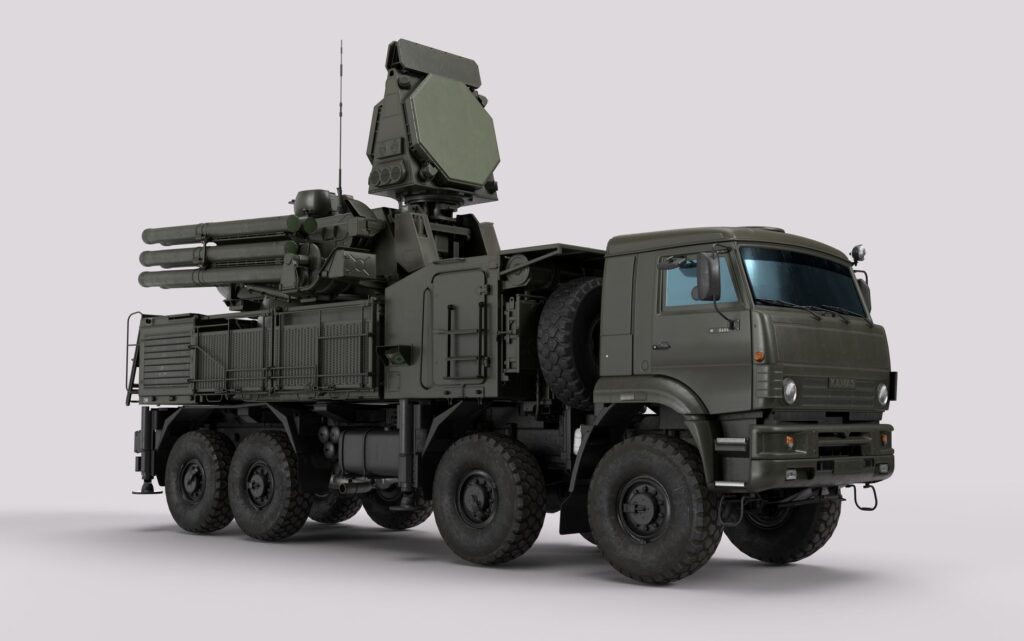 Detailed image of a military vehicle equipped with advanced radar and weaponry systems.