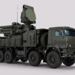 Detailed image of a military vehicle equipped with advanced radar and weaponry systems.