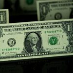 Detailed shot of a one dollar bill highlighting currency and finance themes.