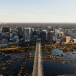 Explore an aerial perspective of the iconic Richmond, Virginia skyline during the day.
