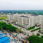 Aerial view of the Kushtia Medical College campus showing modern architecture and lush surroundings.