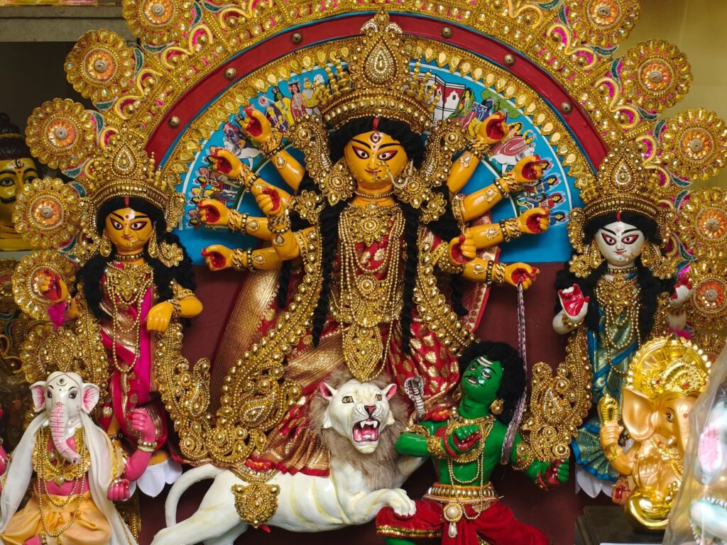 Stunning Durga Puja idol displaying traditional artistry and vibrant colors in Kolkata.
