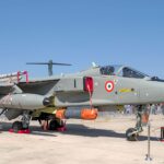 Indian Air Force Jaguar on display at the Bengaluru airshow with clear blue skies.