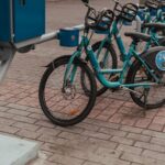 Row of blue rental bicycles at a station in Bandung, Jawa Barat, Indonesia.