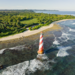 Stunning aerial view of Indira Point Lighthouse on Great Nicobar Island, India.