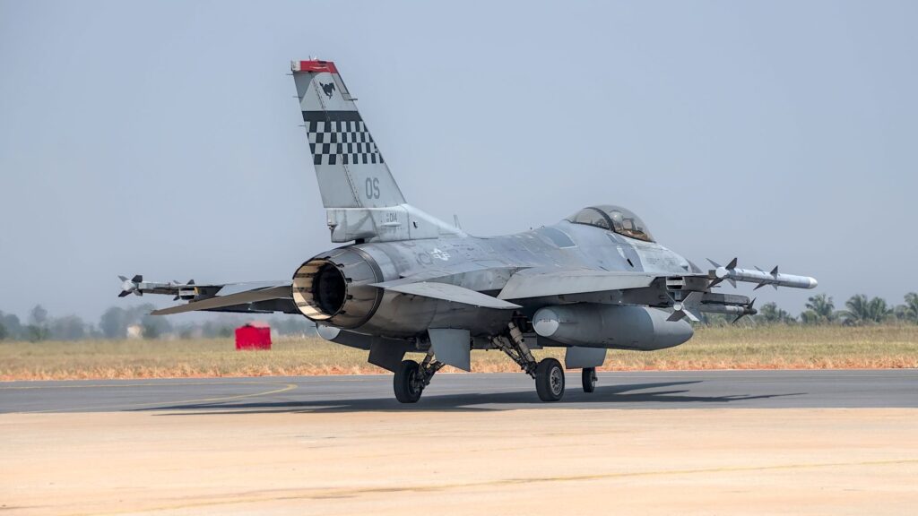 F-16 fighter jet preparing for takeoff at Bengaluru air show.