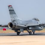 F-16 fighter jet preparing for takeoff at Bengaluru air show.