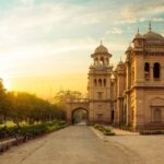 Beautiful view of Islamia College in Peshawar during sunset, showcasing historic architecture and a serene environment.