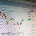 Close-up of digital cryptocurrency market graph showing price fluctuations and trading data.