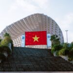 Vietnamese flag at a prominent architectural structure in Đà Nẵng.